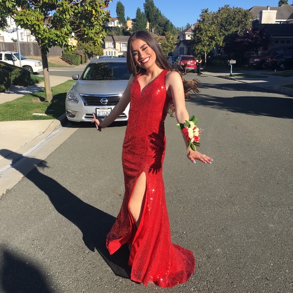 red sparkly dress with slit